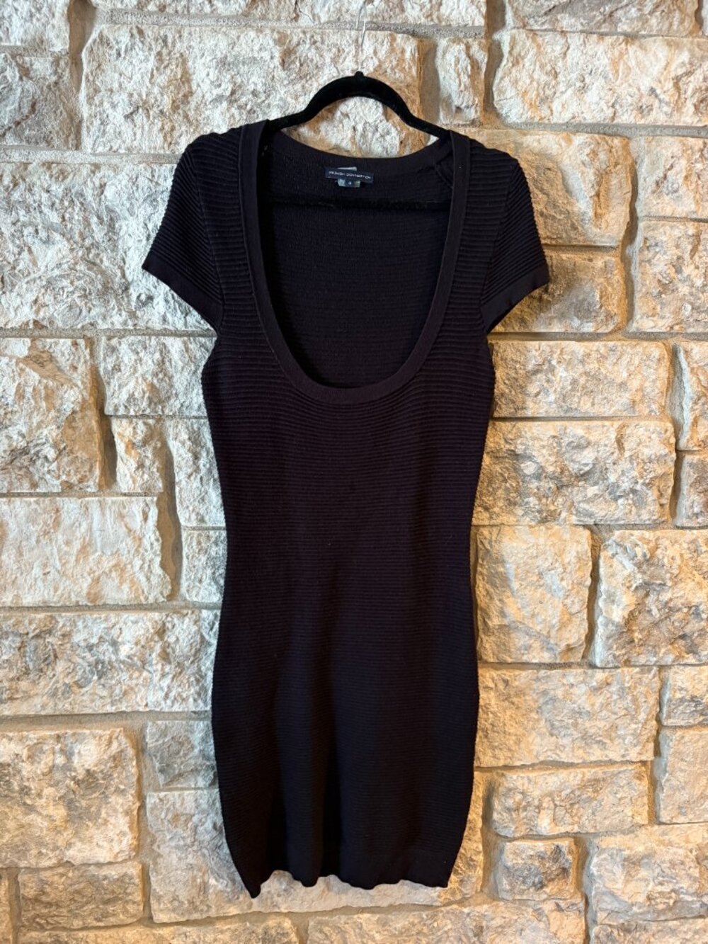 Black French Connection Ribbed Dress with very Deep Scoop Neck. Size: 8